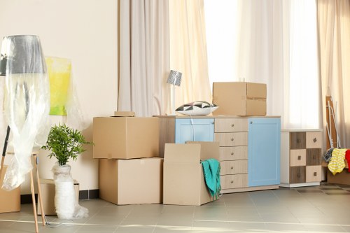 Storage team assessing belongings for a Mayfair quote